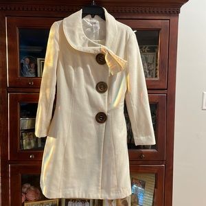 Off White pea coat with beautiful lines.  The top is very flattering as well.